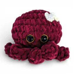 Pieuvre au crochet en fil chenille bordeaux velours 9cm avec noeud blanc.